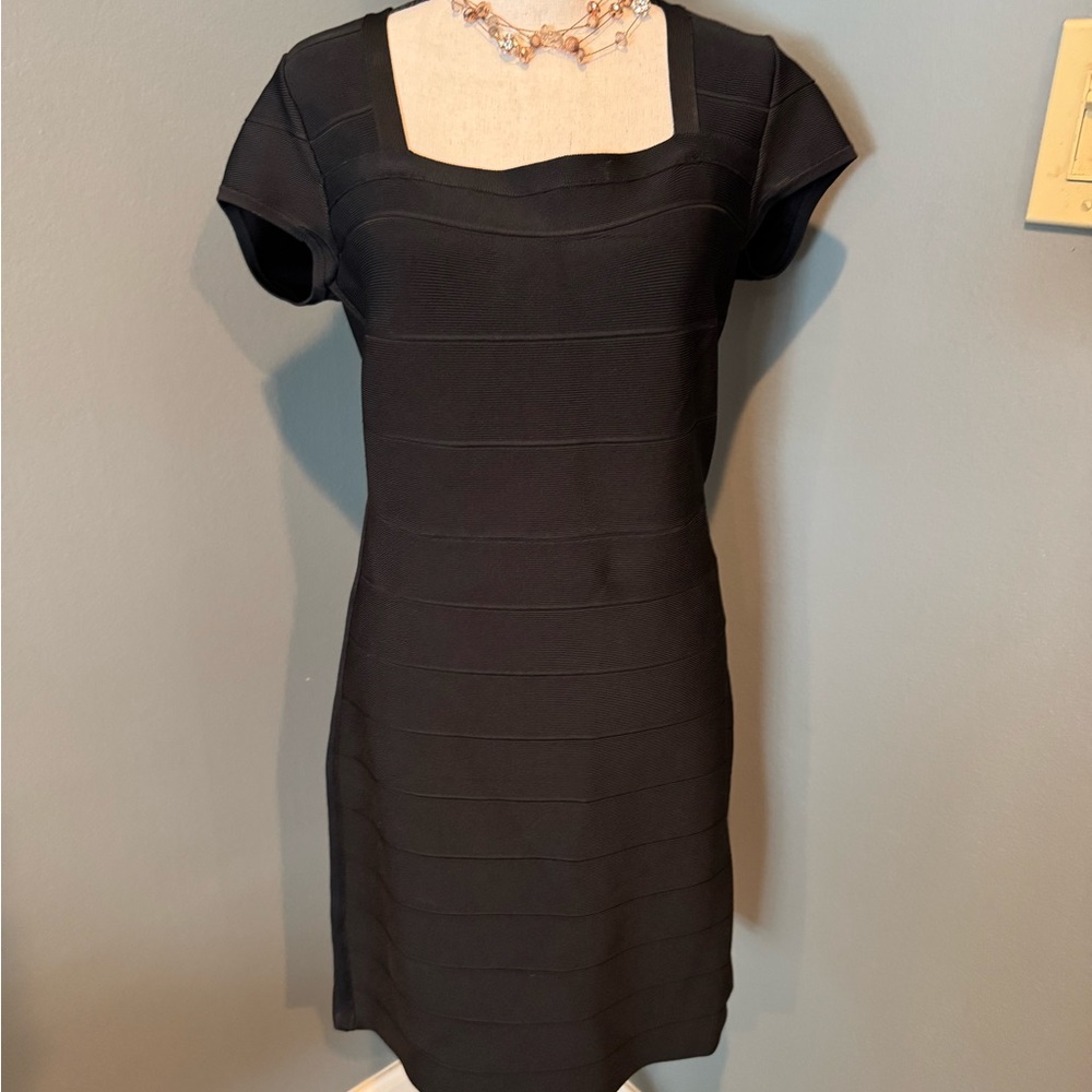 Black bandaid dress. Square neckline. New without tag.